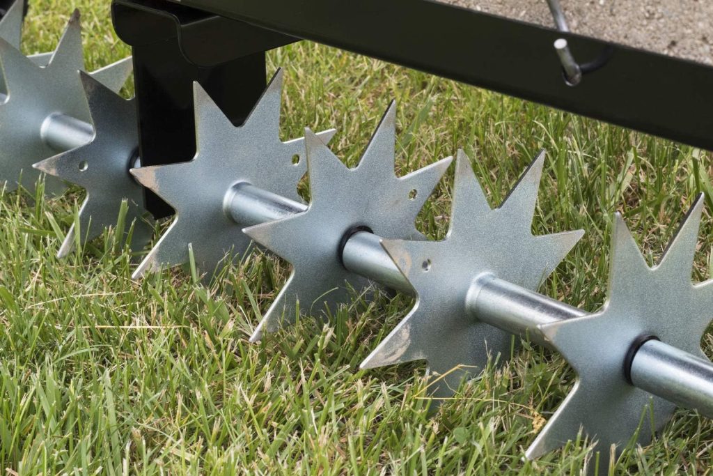 Agri-Fab 40 Inch Tow Behind Spike Aerator Attachment for Riding Lawn Mowers.