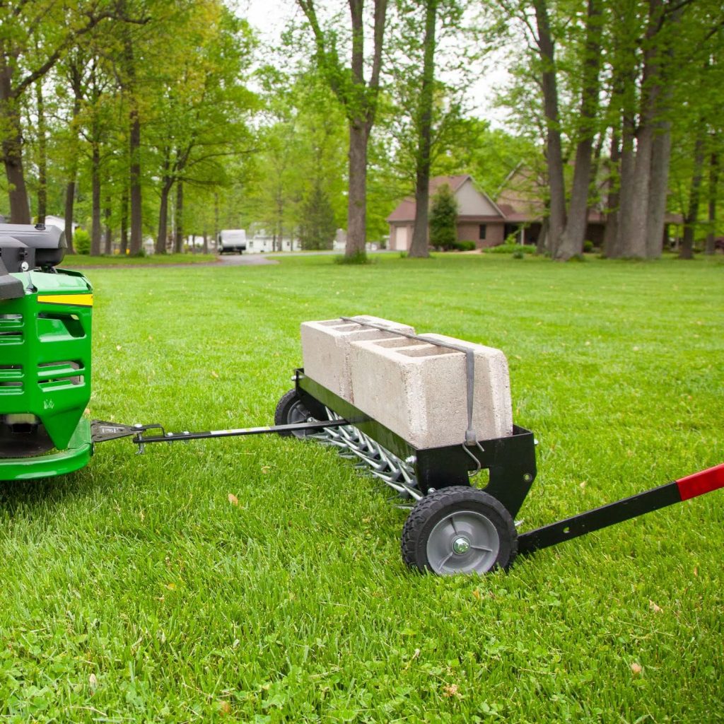 Brinly 40 Inch Tow Behind Spike Aerator Attachment for Riding Lawn Mowers.