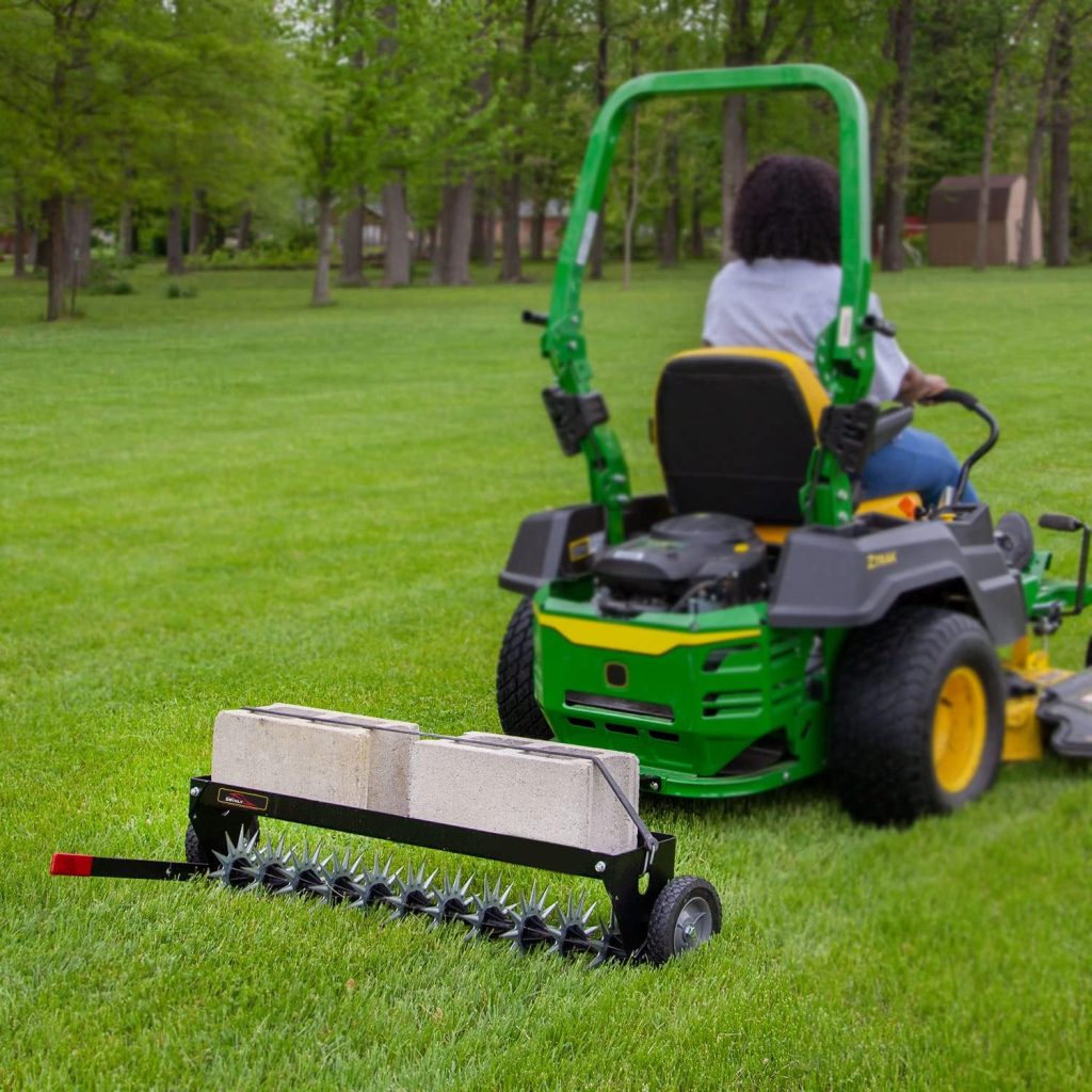 Brinly 40 Inch Tow Behind Spike Aerator Attachment for Riding Lawn Mowers.