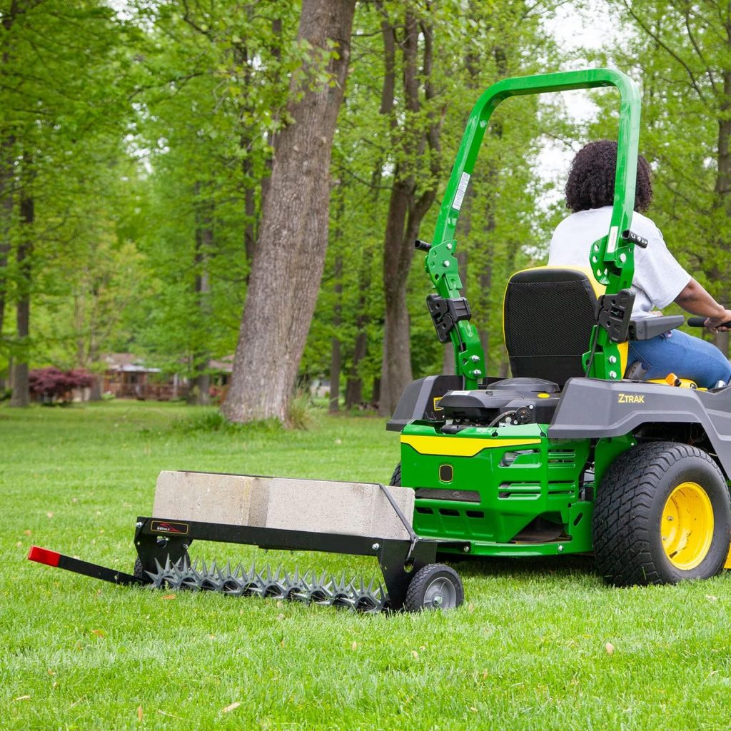 Brinly 40 Inch Tow Behind Spike Aerator Attachment for Riding Lawn Mowers.