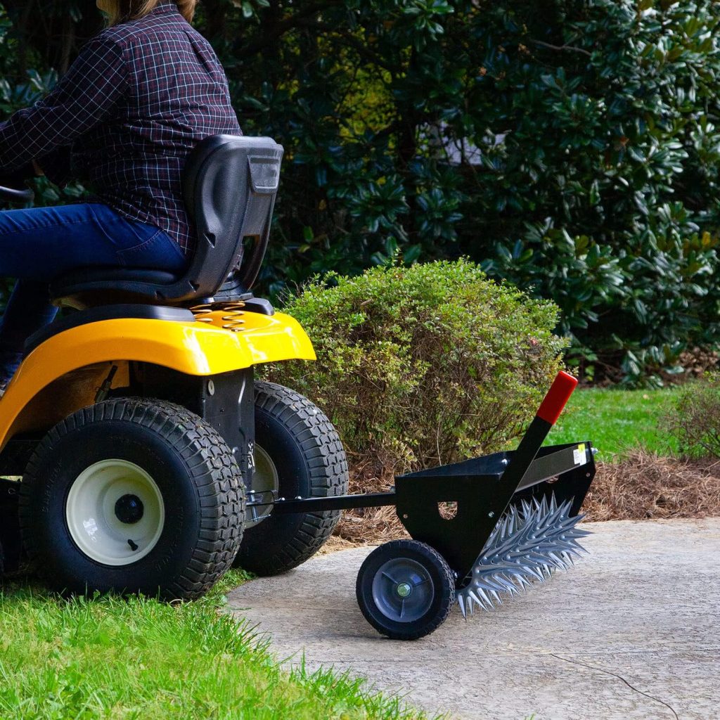 Brinly 40 Inch Tow Behind Spike Aerator Attachment for Riding Lawn Mowers.