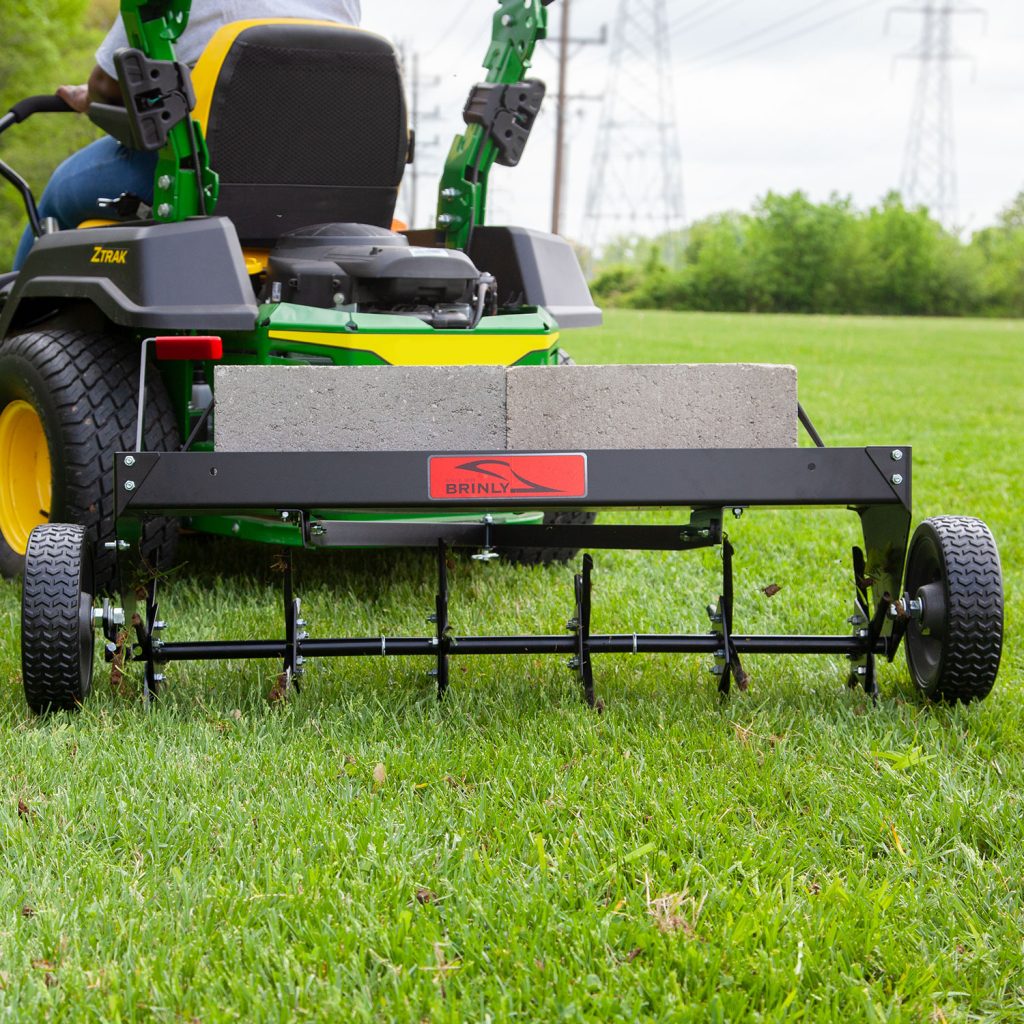 Brinly-Hardy 40 Inch Tow Behind Plug Aerator Attachment for Riding Lawn Mowers.