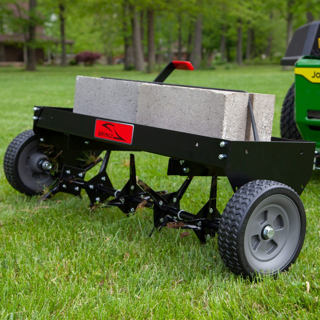 Brinly-Hardy 40 Inch Tow Behind Plug Aerator Attachment for Riding Lawn Mowers.