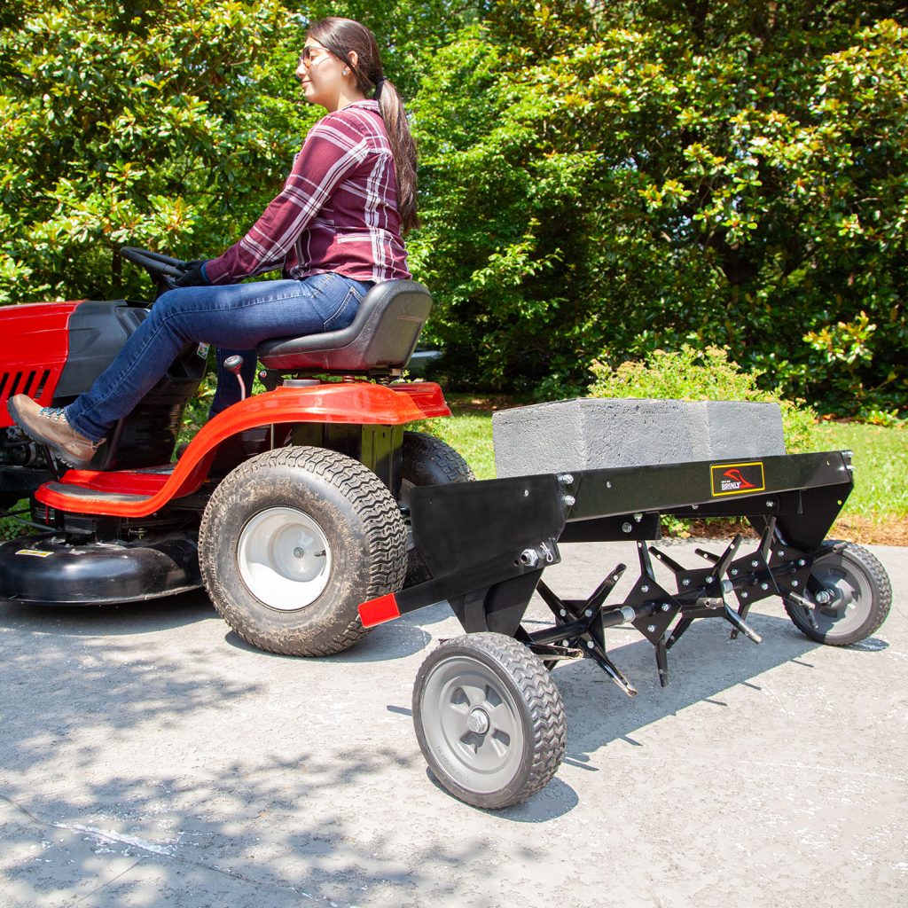 Brinly-Hardy 40 Inch Tow Behind Plug Aerator Attachment for Riding Lawn Mowers.