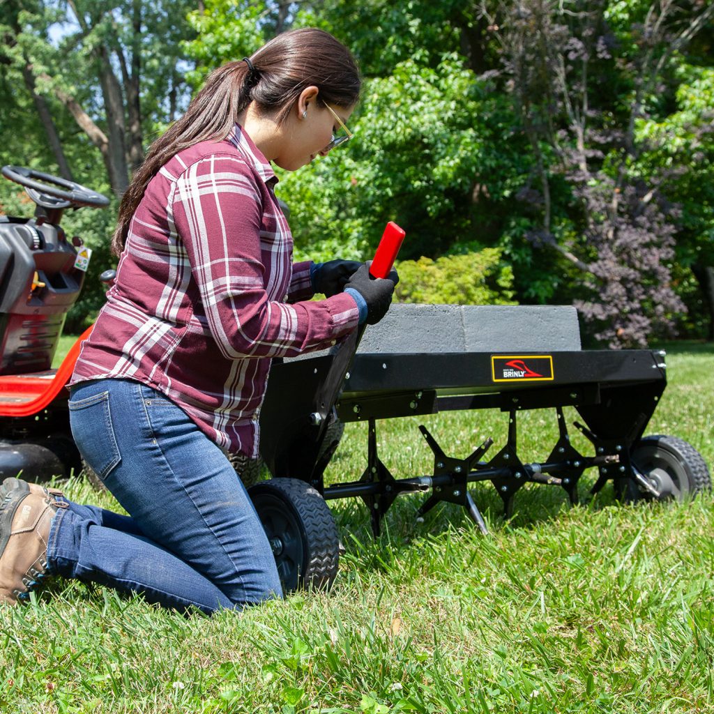Brinly-Hardy 40 Inch Tow Behind Plug Aerator Attachment for Riding Lawn Mowers.