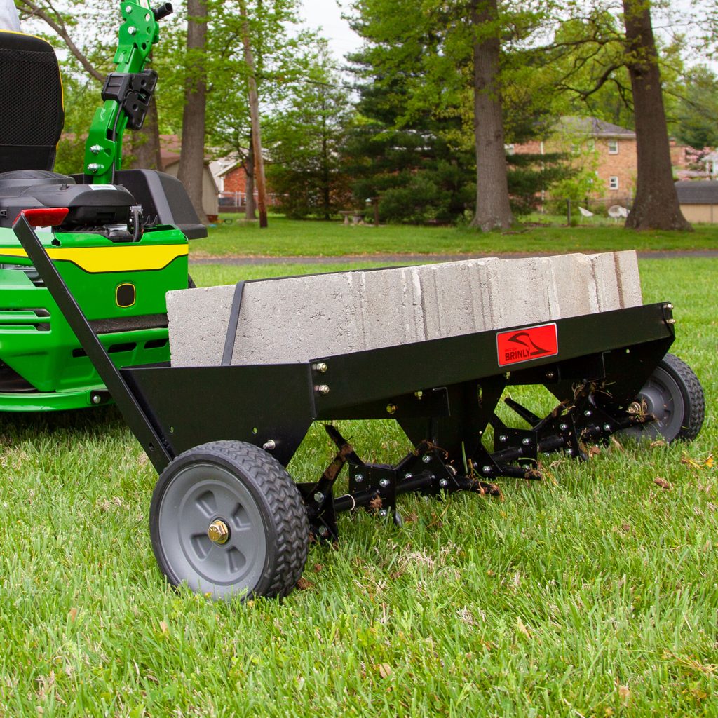 Brinly-Hardy 48 Inch Tow Behind Plug Aerator Attachment for Riding Lawn Mowers.