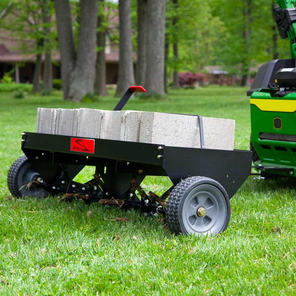 Brinly-Hardy 48 Inch Tow Behind Plug Aerator Attachment for Riding Lawn Mowers.