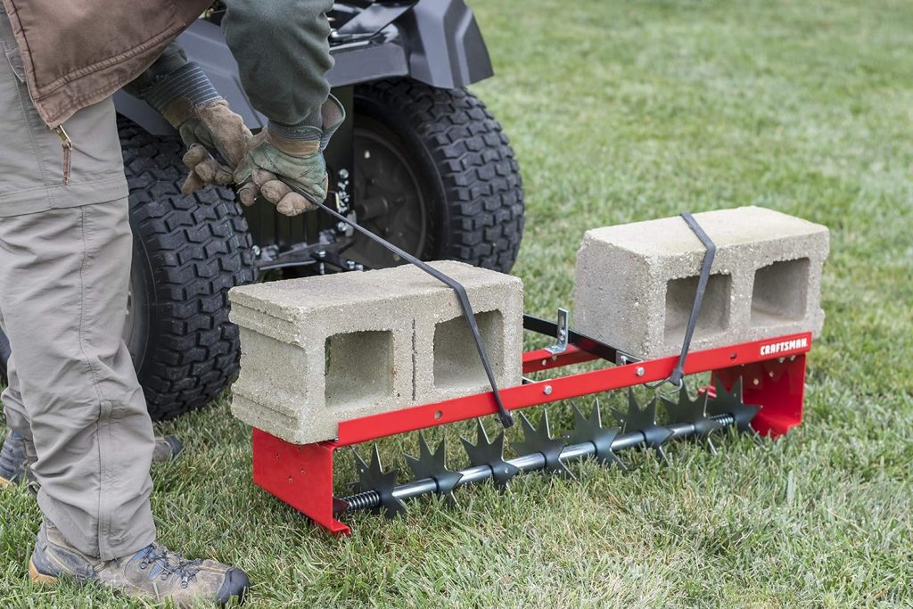 Craftsman 36 Inch Spike Lawn Aerator Attachment for Riding Lawn Mowers.