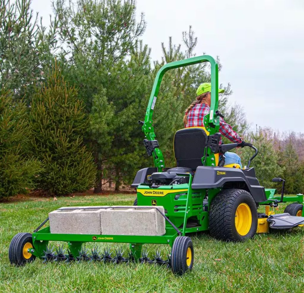 John Deere 40 Inch Tow Behind Spike Aerator Attachment for Riding Lawn Mowers.